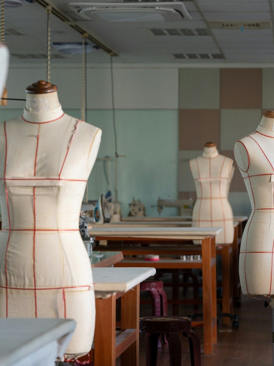 Sewing studio with dress forms and worktables